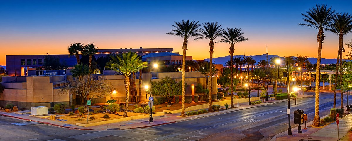 Downtown Henderson at dusk — the civic center on Water Street, Las Vegas Valley beyond